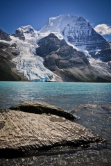 Berg Lake and the Rockies' tallest mountain, Mount Robson (3954m), towering two vertical kilometres over the tarn.